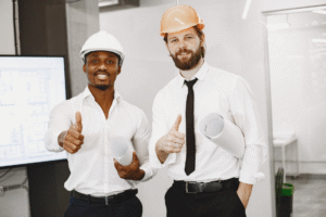 Roofing contractor doing thumbs up discussing project details with a homeowner