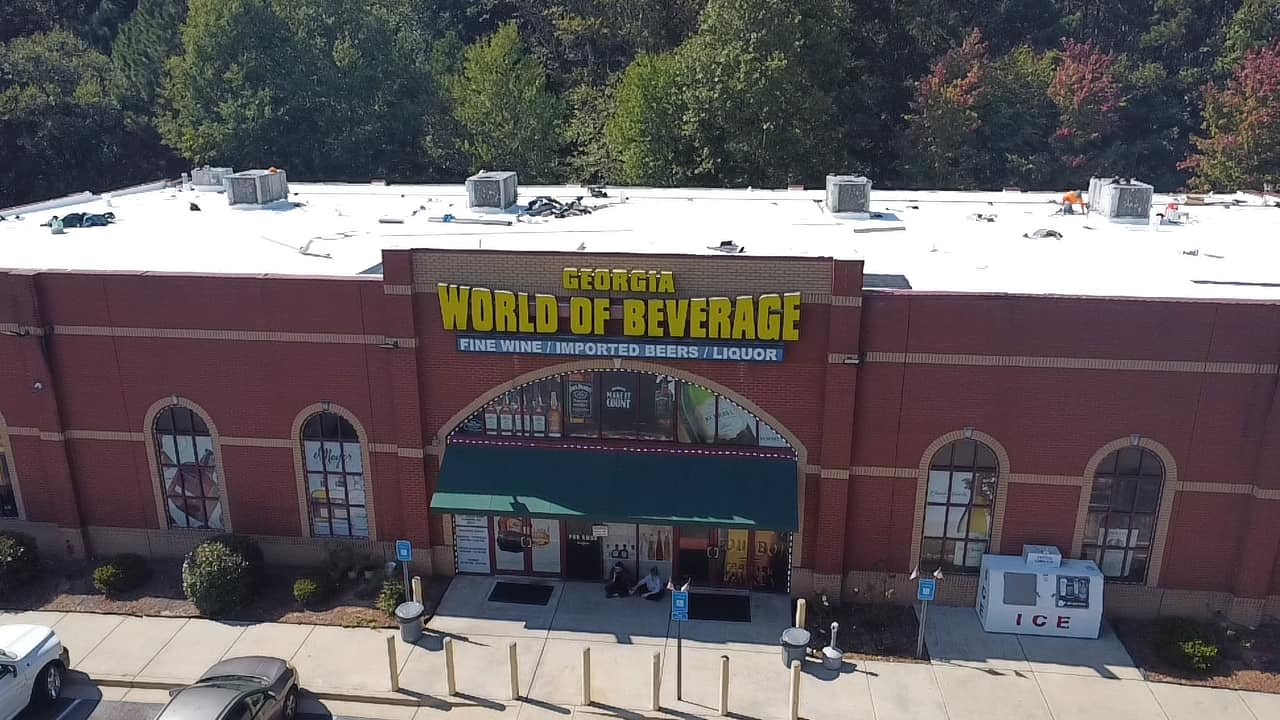 Commercial roof replacement project showing new membrane installation