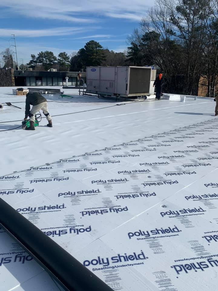Commercial roof membrane repaired and smoothed by professionals in Atlanta