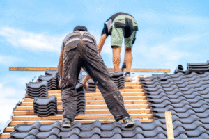 A trained crew performing roof installation ensures structural integrity, proper sealing, and long-term durability for demanding commercial roofing environments.