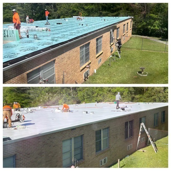 Roofers working on a roof