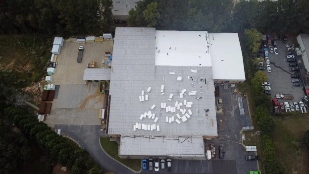 Roofers working on a roof